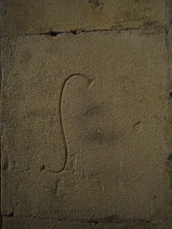 Mason's mark in the Église Saint-Honorat in Alyscamps France, early 13th century