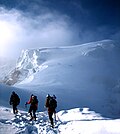 Image 6Mountaineers proceed across snow fields on South Tyrol; other climbers are visible further up the slopes. (from Mountaineering)