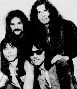 Henrit (top left) as a member of Argent