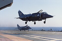 Pacific Fleet Air Force Yakovlev Yak-38 VTOL strike aircraft are on and over the Novorossiysk's flight deck, 1984
