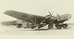 Zveno-SPB of the Black Sea Fleet Air Force: a Tupolev TB-3 4AM-34FRN mothership with two Polikarpov I-16 parasite fighters armed with FAB-250 bombs, a pre–World War II photo