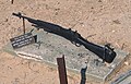 The Lee–Enfield jungle carbine (rifle No. 5 Mk I) with a conical flash suppressor (muzzle shroud)
