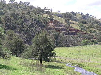 Swamp Oak Creek and the rail cutting at Limbri