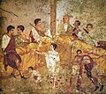 Image 39A multigenerational banquet depicted on a wall-painting from Pompeii, 1st century AD (from History of clothing and textiles)