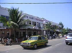 A building labelled "NITE CLUB & RESTAURANT" next to a two-way road