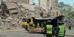 Rescue teams at a collapsed building in Caracas