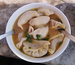 Broth made from achar used for jhol momo