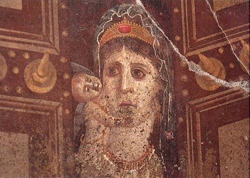 This mid-1st century AD Roman wall painting in Pompeii, Italy, showing Venus holding a cupid is most likely a depiction of Cleopatra VII of Ptolemaic Egypt as Venus Genetrix, with her son Caesarion as the cupid