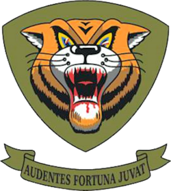 Circular emblem of the 366th Fighter-Bomber Wing showing a winged sword on a blue background