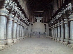 Elaborate prayer hall with pillars in a cave