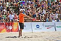 Image 2A linesman signals that a ball is "in" (from Beach volleyball)