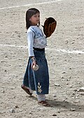 Image 19An Afghan girl playing baseball in August 2002 (from Baseball)