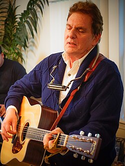 Sloan performing in 2014