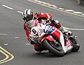 2013 Isle of Man TT Superbike Race Lap 6 – Michael Dunlop (6) 1000cc Honda Parliament Square, Ramsey 2 June 2013.