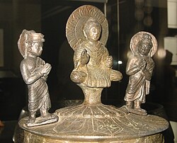 The Kushan Kanishka casket of 127, with (left to right) Brahma, the Buddha and Indra