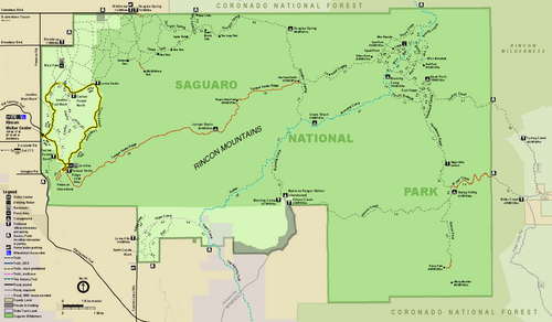Map of the Rincon Mountain District, an irregular retangle, wider than long, colored green, and surrounded by areas colored brown or light purple that are outside the park