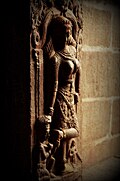 A sculpture adorning interior gate of Kolarmma Temple