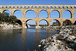 Pont du Gard seen from the river Gardon