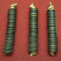 Bundles of 100 copper Mon coins; they were the official currency of Japan in the Muromachi period, from 1336 until 1870. These coins are from the Edo period.