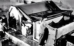 State of the damaged coffin, as photographed as part of the post-1938 looting investigations
