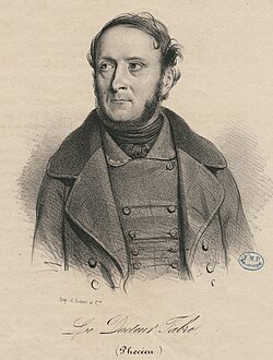 Man with a beard wearing a coat.
