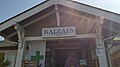 The cannabis dispensary Kaleafa in Portland, Oregon's Woodstock neighborhood during the coronavirus pandemic, as evidenced by the signage and customers practicing social distancing