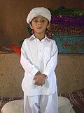 Baloch child in Balochi male clothes