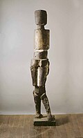 Figure composed of ceramic forms (1961), polychromed plaster, h.142 cm