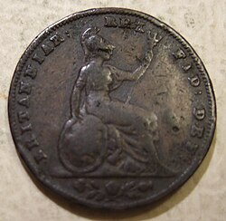 Copper coin of a seated woman Britannia