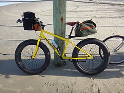 TommiSea Fat Sand Bike equipped for long-distance beach trekking, photographed at the Virginia-North Carolina border.