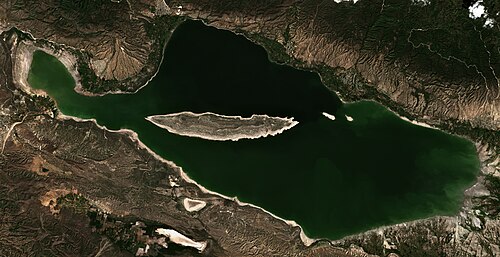 Lake Enriquillo is the biggest saltwater—hypersaline lake in the Dominican Republic. It is located in Enriquillo wetlands, and is the largest lake in both the Dominican Republic and Hispaniola, as well as the entire Caribbean. At 46-meters below sea level, it is the lowest point on the island or any island country.