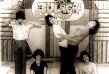 A monochrome image of five people.