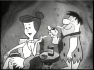 File:Fred and Wilma Flintstone advertising cigarettes.jpg
