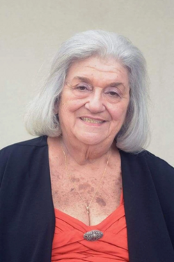 A color photograph of a headshot of an elderly woman