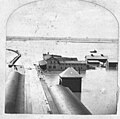 Council Bluffs Transfer Depot outbuildings in the flood of 1881. The outbuilding housed the emigrant hotel, the bakery, laundry rooms, land office, and the freight cold storage warehouse.