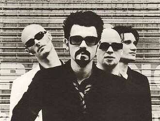 Shudder to Think in 1996. L–R: Craig Wedren, Nathan Larson, Kevin March, and Stuart Hill
