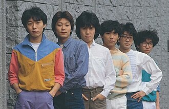 S. Kiyotaka & Omega Tribe c. 1983–1985  L–R: Kiyotaka Sugiyama,Takao Oshima, Shinji Takashima, Toshitsugu Nishihara, Kenji Yoshida, and Keiichi Hiroishi