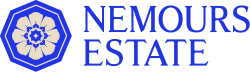 Consists of a light gray flower surrounded by a blue octagon and reading "Nemours Estate" in blue